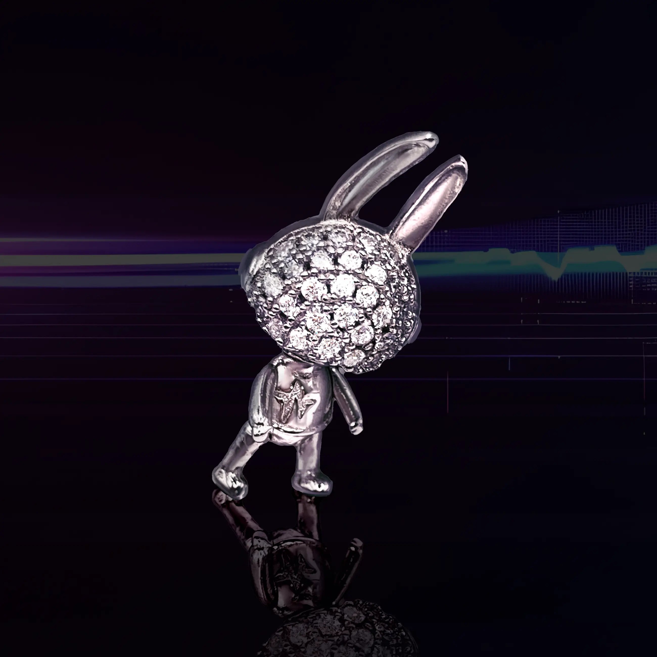 Silver rabbit-shaped earring with moissanite pave on a reflective surface